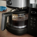 Drip coffee maker with built-in grinder