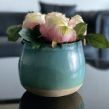 Faux Roses in Sky Blue Pot