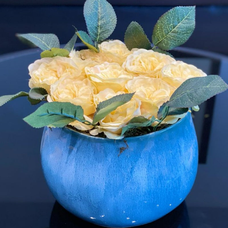 Faux Yellow Roses in Blue Pot