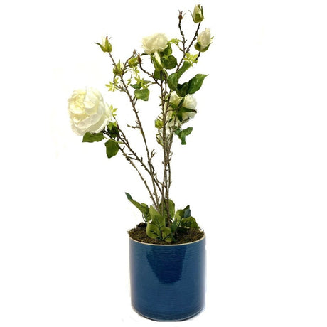 Flower Arrangement in Blue Pot