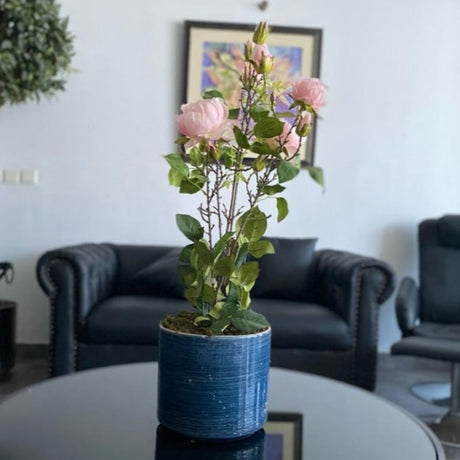 Flower Arrangement in Blue Pot