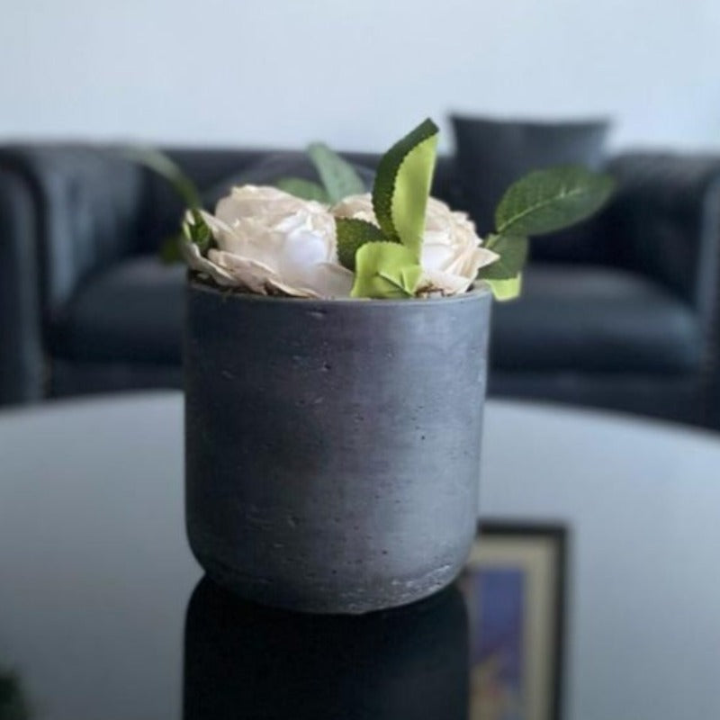 White Faux Roses in Black Cement Pot